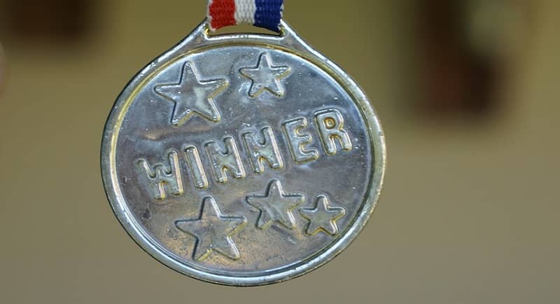 silver medal with text - winner